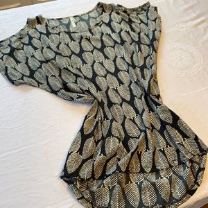 Audrey cold-shoulder blouse. Unique Ivory and black leaf pattern. Size Medium.